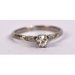 A white metal diamond solitaire ring, the principal stone weighing approx 0.