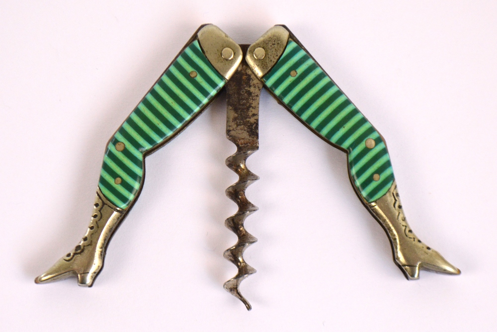 A pair of early 20th century German "Lady's Legs" corkscrew decorated with green and white striped