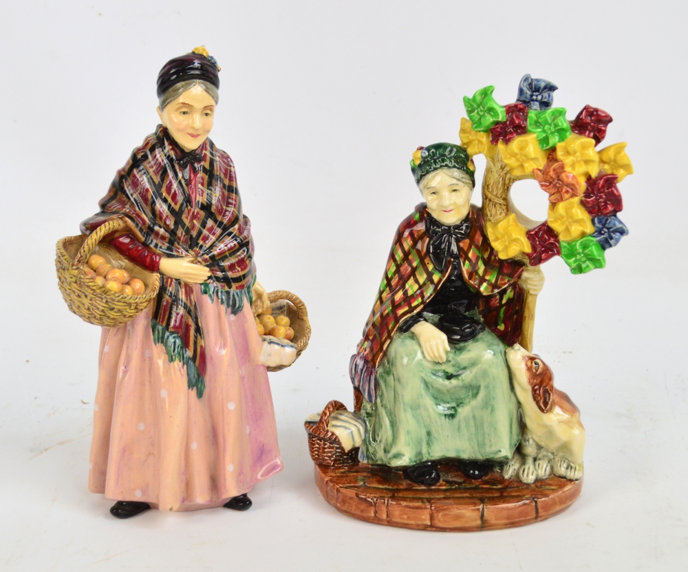 Two Royal Doulton figures; HN1400 "The Windmills Lady" and HN1759 "The Orange Lady" (2).