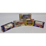 Five assorted boxes containing a large quantity of boxed Corgi scale models (approx 143)