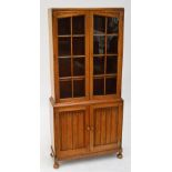 An early 20th century oak freestanding bookcase,