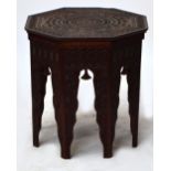 An Eastern carved hardwood octagonal table, 51 x 51cm, height 53cm.