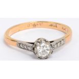 An 18ct yellow gold diamond ring, the central principle stone approx 0.