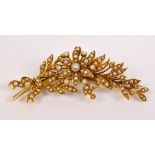 An Edwardian yellow metal and seed cultured pearl floral bar brooch,