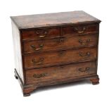A Georgian mahogany chest of two short above three long drawers, with crossbanded top,