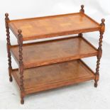 An oak and marquetry decorated three tier side table, with barleytwist supports, 77 x 39cm,