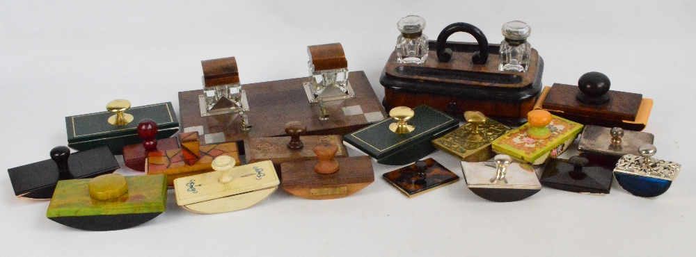 An Art Deco mahogany rosewood and silver plate mounted double inkstand with twin glass inkwells and