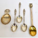 An Elizabeth II hallmarked silver novelty spoon with gilt washed interior and gilded owl finial,