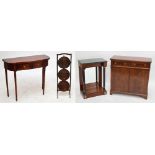 A reproduction mahogany two drawer hall table with four turned and fluted tapering legs, width 85cm,