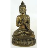 A 20th century Sino-Tibetan metal figure of a Buddha seated on a lotus base, height 31cm.