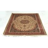 A beige ground Keshan carpet, 230 x 160cm.