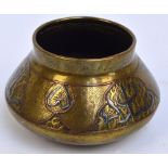 An 18th/19th century Islamic squat bowl with silver and copper inlaid decoration, diameter 11.5cm.