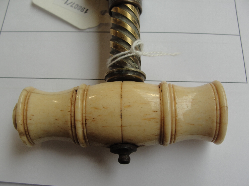 A 19th century Thomason type double action brass corkscrew with turned bone handle and leaf moulded - Image 7 of 7