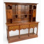 A reproduction oak dresser,