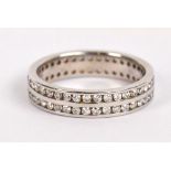 An 18ct white gold double row full eternity ring, size M/N, approx 4.1g.