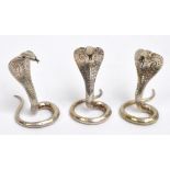 A set of three Ceylonese menu holders modelled as cobras, hallmarked for Kandy, height 4.