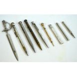 A group of six propelling pencils to include hallmarked silver examples,