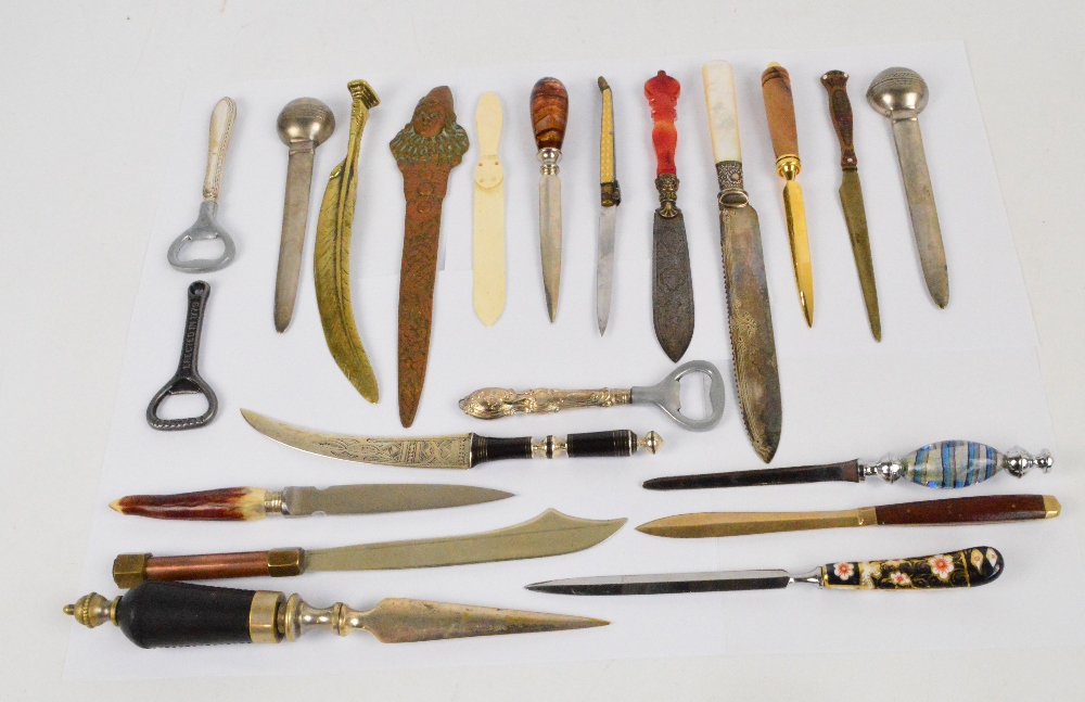 A group of eighteen various paper knives/letter openers and three bottle openers including