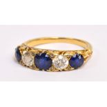 A Victorian yellow metal five stone dress ring,