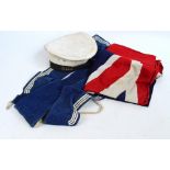 A cotton Union flag 95 x 170cm, a white and navy blue naval hat,