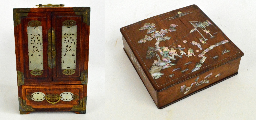 An Oriental jewellery cabinet with gilt metal mounts and pierced hardstone panels,