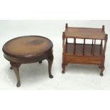 A mahogany two tier lamp table raised on squat cabriole legs,