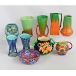 A group of decorative arts ceramics including a British "Roskyl" pottery vase, pair of Bretby vases,