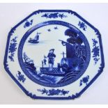 A 19th century Chinese blue and white painted octagonal plate decorated with a figure holding a