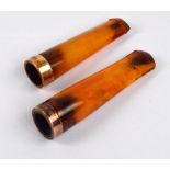 Two 9ct gold mounted cigar holders, one hallmarked for Birmingham 1899, length 7cm,