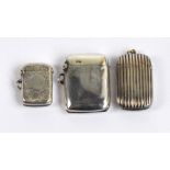 A Victorian hallmarked silver vesta case of rounded rectangular form with overall fluted body,