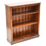 A reproduction oak freestanding open bookcase with three shelves, height 97cm, width 90cm.