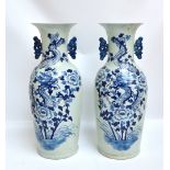 A pair of decorative Chinese blue and white twin handled vases, height 60.5cm.