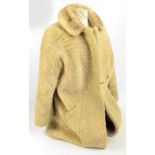 A Kendal Milne three quarter length lady's lambswool jacket with a blonde mink collar,