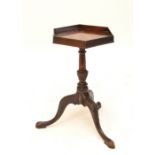 An early 20th century George II style mahogany kettle stand,