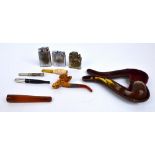 A small quantity of smoking related items comprising a small Meerschaum pipe in the form of an