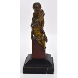 An early 20th century bronze figure modelled as two cherubs standing on a marble column, unsigned,