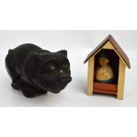 Two 1930s pressed papier mâché figures; a pug dog with detachable head,