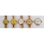 Four lady's vintage 9ct gold cased wristwatches, three with straps, and a gold plated example (4).