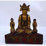 A 19th century gilded and painted seated figure of the crowned Buddha with a pair of attendants by