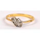 An 18ct yellow gold three stone diamond collet set ring, size P, approx 2.3g.