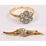 A 1920s yellow gold and diamond cluster ring (hallmarks rubbed),