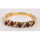 An 18ct gold ruby and diamond chip dress ring, size P, approx 2.5g.