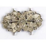 An Elizabeth II hallmarked silver nurse's belt buckle,