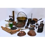 A quantity of metalware and kitchenalia including a brass jam pan, wooden butter pat, copper pans,