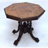 An Edwardian inlaid octagonal occasional table.