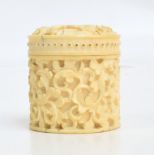 A 19th century Chinese Canton carved ivory small cylindrical box with screw cover,