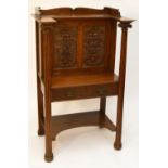 An unusual late 19th/early 20th century oak side cabinet,