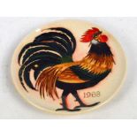 A boxed Moorcroft limited edition 1988 plate decorated with a cockerel, numbered 202/250,