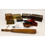 A walnut jewellery box modelled as books with inlaid hinged lid, three vintage tin money boxes,