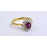 BOODLE & DUNTHORNE; an 18ct yellow gold diamond and ruby floral set ring,